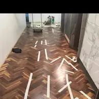 Patterned wood floor installation